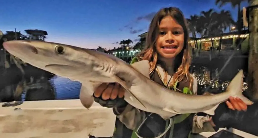 Kids fishing aboard Mark The Shark's charter boat